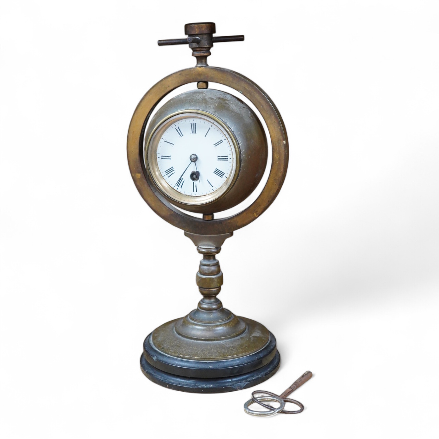A late 19th century nautical theme brass timepiece barometer, surmounted by a compass, 30cm high